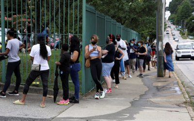 Voters line up to cast their ballots in Atlanta