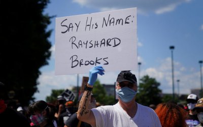 Protesters rally against racial inequality and the police shooting death of Rayshard Brooks, in Atlanta