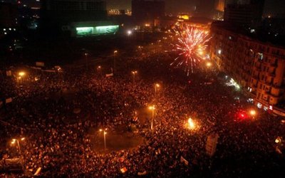 FILE PHOTO: General view of Tahrir Square as fireworks explode during a pro-democracy supporters' celebration in Cairo