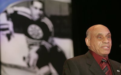 First black hockey player Willie O'Ree speaks during a luncheon honoring O'Ree's 50th anniversary debut in the NHL in Atlanta.
