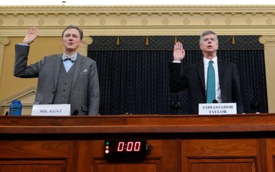 Taylor and Kent are sworn in at House Intelligence Committee hearing as part of Trump impeachment inquiry on Capitol Hill in Washington