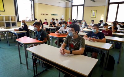 Children return to school for the first time since March, in Rome