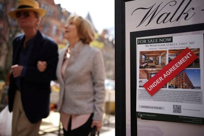 A sign shows a property for sale "under agreement"  in Boston