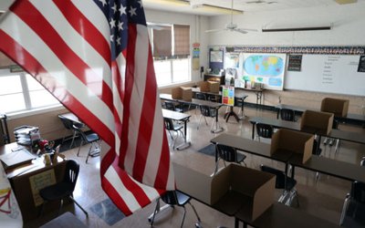FILE PHOTO: Social distancing dividers for students are seen in a classroom at St. Benedict School, amid the outbreak of the coronavirus disease (COVID-19), in Montebello, near Los Angeles