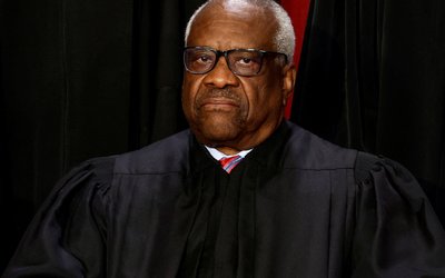 FILE PHOTO: U.S. Supreme Court justices pose for their group portrait at the Supreme Court in Washington