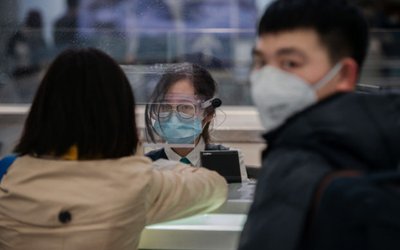 Reaction In Hong Kong As WHO Considers Emergency Decree