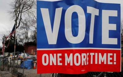 A sign urging residents to vote stands in Atlanta