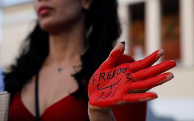Demonstrators take part in a protest following the death of Mahsa Amini, in Athens