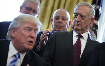 FILE PHOTO: U.S. Defense Secretary James Mattis looks at U.S. President Donald Trump as he speaks during a meeting with Medal of Honor recipients in the Oval Office of the White House in Washington, U.S.