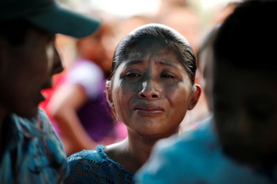 Claudia Maquin mother of Jakelin Caal, a 7-year-old girl who handed herself in to U.S. border agents earlier this month and died after developing a high fever while in the custody of U.S. Customs and Border Protection, reacts during her daughter's funeral