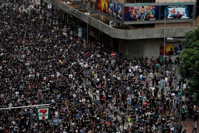 Anti-extradition bill protesters march at Mongkok, in Hong Kong