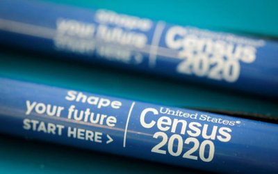 United States Census 2020 merchandise is seen on an information desk at an event where U.S. Rep. Alexandria Ocasio-Cortez (D-NY) spoke at a Census Town Hall at the Louis Armstrong Middle School in Queens, New York City