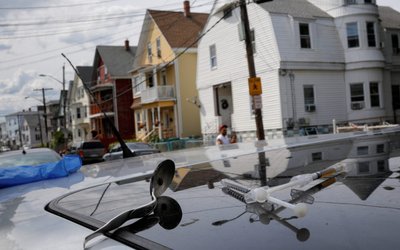 FILE PHOTO: A full syringe, empty syringe and spoon sit on the roof of the car in Lynn
