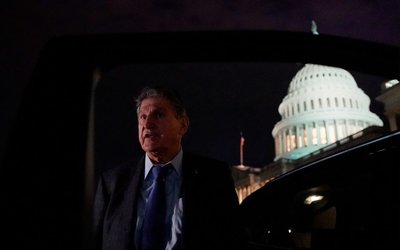 U.S. Senator Joe Manchin (D-WV) talks to reporters as he leaves the U.S. Capitol in Washington