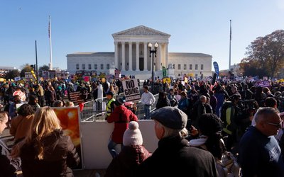 Anti-abortion and pro-abortion rights protesters gather outside Supreme Court in Washington