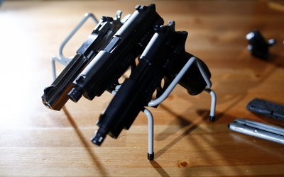 Canada's government introduces legislation to implement a "national freeze" on the sale and purchase of handguns