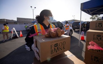 The Los Angeles Regional Food Bank distributes food outside a church during the outbreak of the coronavirus disease (COVID-19) in Los Angeles