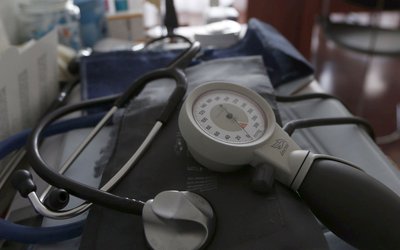 A photo illustration shows a stethoscope and  blood-pressure machine as a French general practitioner works in a doctor's office in Bordeaux