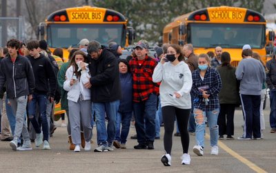 Parents leave with students after Oxford High School Shooting