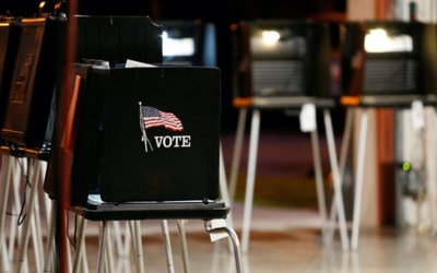 FILE PHOTO: A voting booth is seen at a polling center inside a fire station in the Coral Gables neighbourhood during the Democratic presidential primary election in Miami