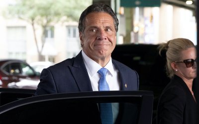 New York Governor Andrew Cuomo arrives to depart in his helicopter after announcing his resignation in Manhattan, New York City