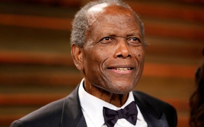 FILE PHOTO: Actor Sidney Poitier arrives at the 2014 Vanity Fair Oscars Party in West Hollywood