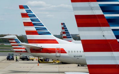 FILE PHOTO: American Airlines planes are parked at the gate during the coronavirus disease (COVID-19) outbreak  in Washington