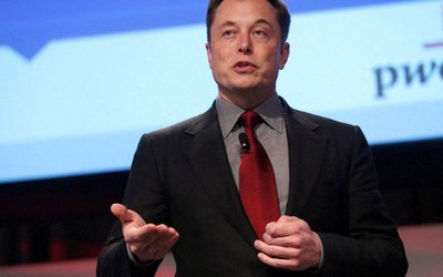 FILE PHOTO: Elon Musk talks at the Automotive World News Congress at the Renaissance Center in Detroit