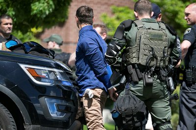 Group of men arrested after they were found in the rear of a U Haul van in Coeur d'Alene