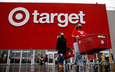 Shoppers exit a Target store during Black Friday sales in Brooklyn, New York