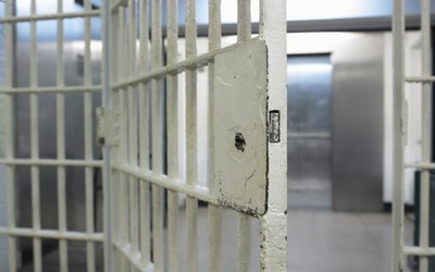 Open door to prison cell