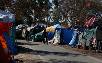 City officials have begun what they are calling a slow and methodical clean-up and removal of a large homeless encampment along the Santa Ana River Trail in Anaheim, California
