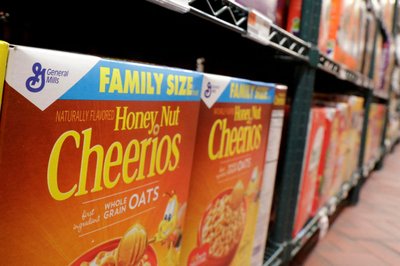 FILE PHOTO: FILE PHOTO: General Mills cereals rest on a shelf inside of a grocery store in New York