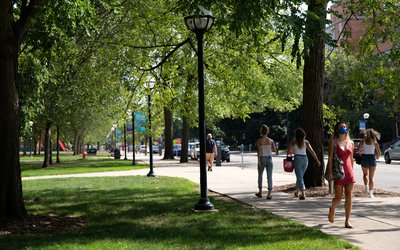Students walk through the University of Michigan campus in Ann Arbor