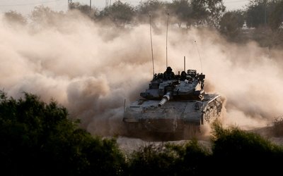 FILE PHOTO: An Israeli tank manoeuvres near the Israel-Gaza border