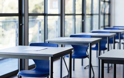 empty-college-classroom-desks-GettyImages-1171004759-1024x683