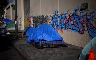 Tents are pitched on a sidewalk in Skid Row, Los Angeles