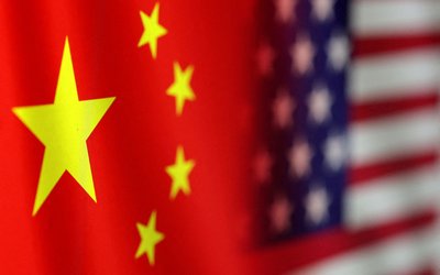 FILE PHOTO: Illustration shows U.S. and Chinese flags