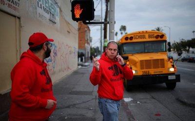 Immigrant rights advocacy volunteers patrol streets for ICE activity in Los Angeles