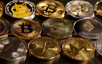 FILE PHOTO: Illustration shows representations of cryptocurrencies