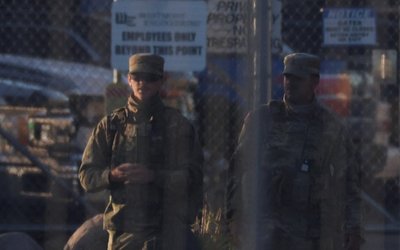National Guard members walk at U.S. ICE Broadview facility in Chicago, Illinois