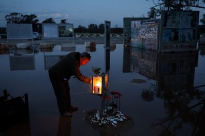 Lighting of the menorah on the third night of the Jewish holiday of Hanukkah at the site of the Nova festival, in Reim