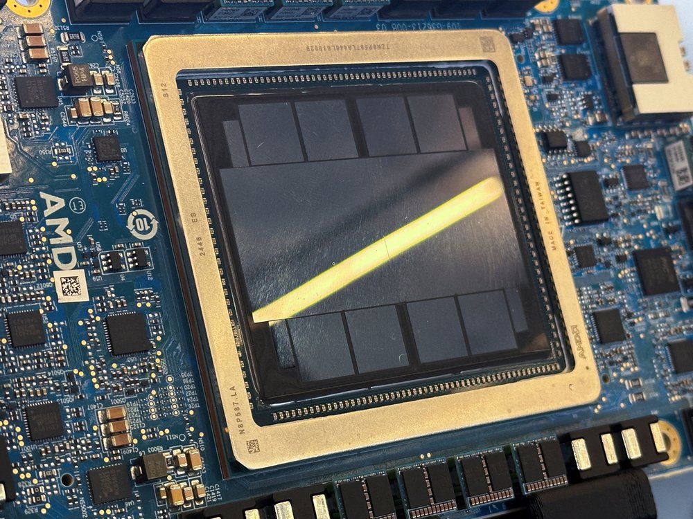 FILE PHOTO: An AMD MI350 series artificial intelligence chip is diplayed at the San Jose McEnery Convention Center