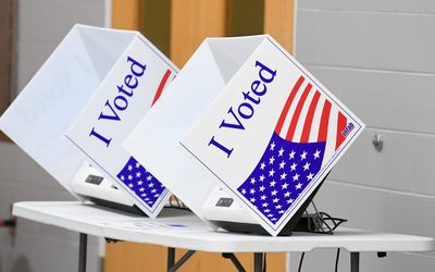 2026-06-23T212757Z_1519763688_MT1USATODAY29254705_RTRMADP_3_VOTING-BOOTHS-ARE-SET-UP-TUESDAY-JUNE-23-2026-DURING-THE-e1786392101996
