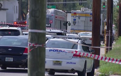 Police cars gather outside shooting in Jacksonville, FL
