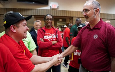 <bound method CaptionedImage.default_alt_text of <CaptionedImage: Volkswagen factory workers' unionization vote results watch party in Chattanooga>>