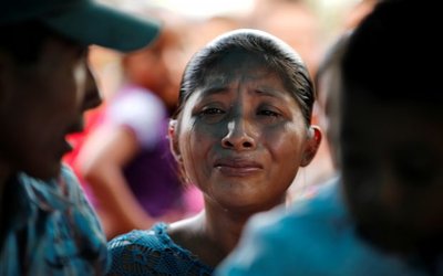 Claudia Maquin mother of Jakelin Caal, a 7-year-old girl who handed herself in to U.S. border agents earlier this month and died after developing a high fever while in the custody of U.S. Customs and Border Protection, reacts during her daughter's funeral