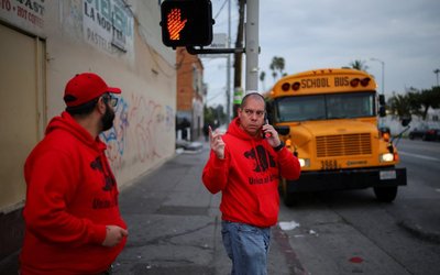 Immigrant rights advocacy volunteers patrol streets for ICE activity in Los Angeles