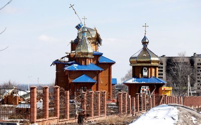 A view shows a damaged church in Volnovakha
