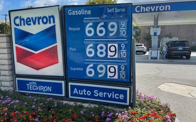 Gas prices are advertised at Chevron station in Los Angeles